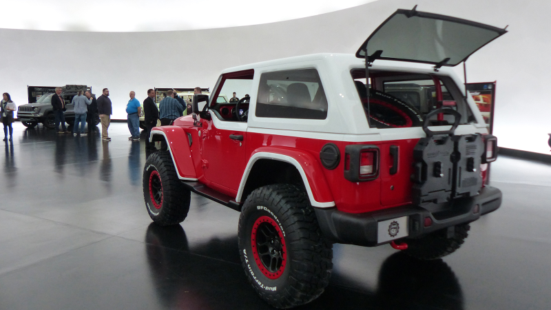 Illustration for article titled The Jeep Jeepster Concept Puts Modern Off-Road Tech Under 1960s Style